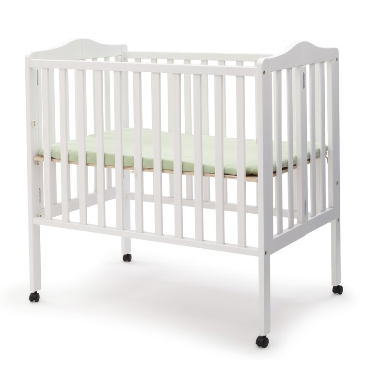 Delta children folding outlet portable crib with mattress